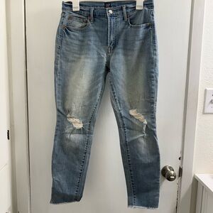 GAP “True Skinny”  Distressed jeans. Size 8 has two spots in the front leg